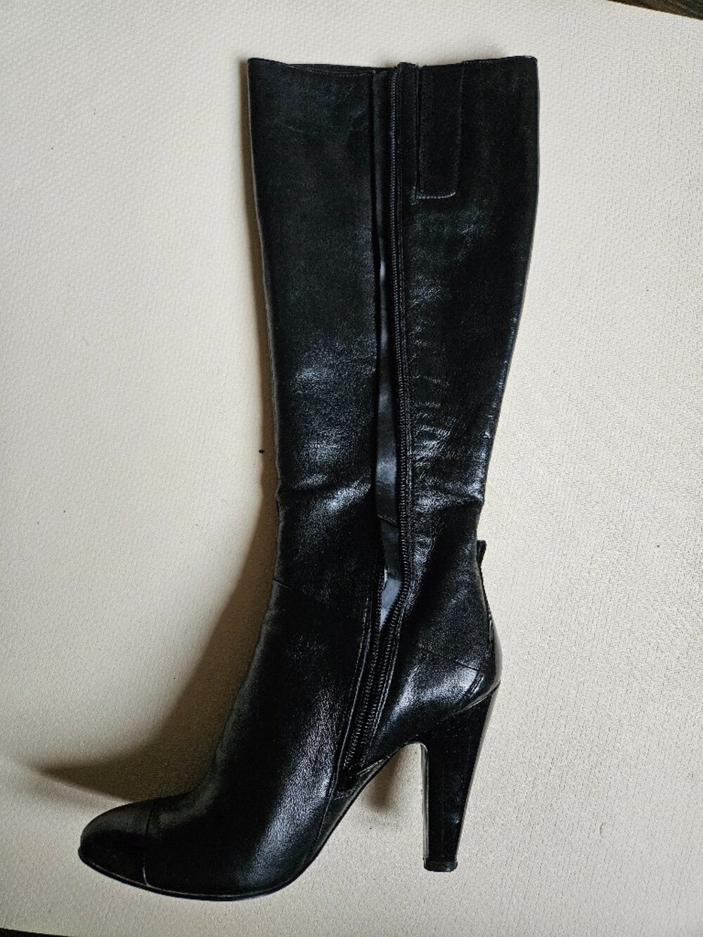 Tall black leather boots
